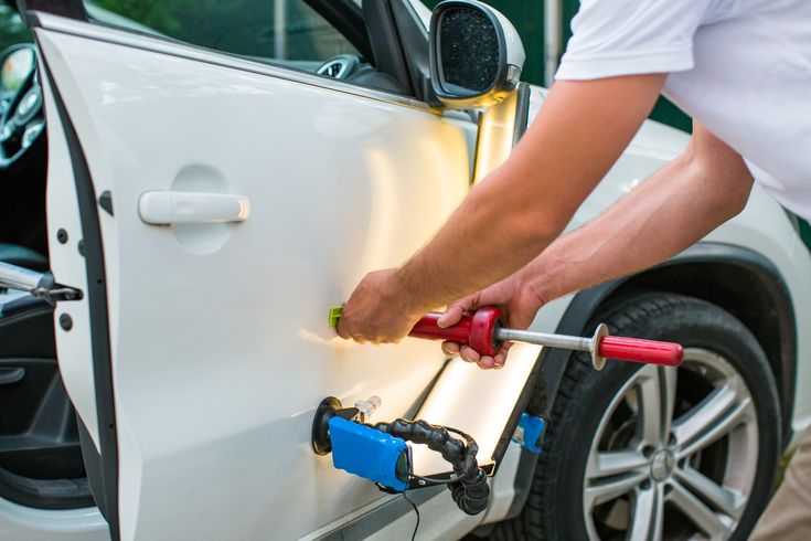 Remove a dent AliCo Rental Car